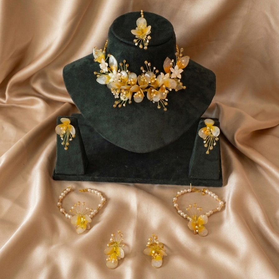 Suvarnika Ivory Yellow Resin Jewellery Set